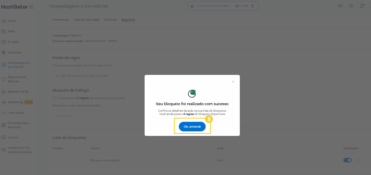 Tela do painel de configuração de bloqueio de tráfego na plataforma HostGator, exibindo opções de país e ação de bloqueio.